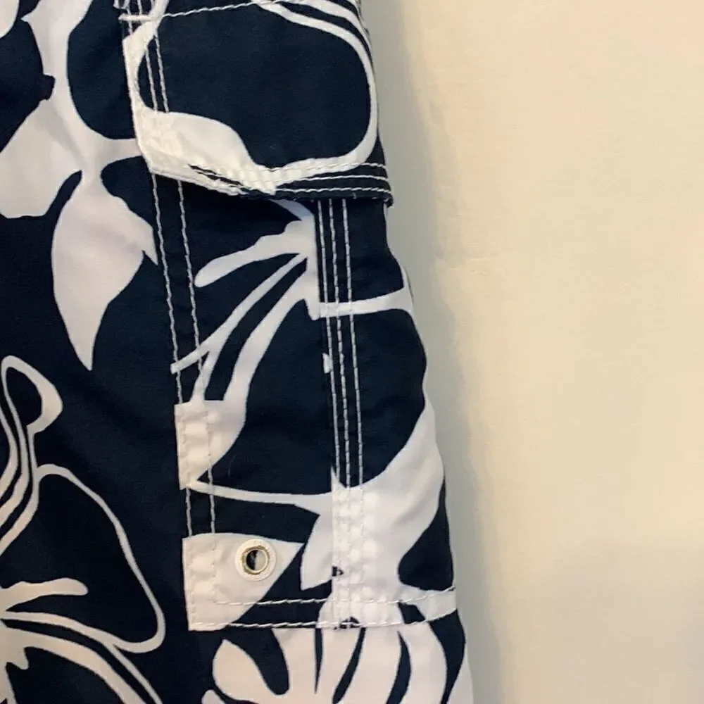 3/$30 Old Navy navy and white boys swim trunks with pockets. Size L( 10-12 )